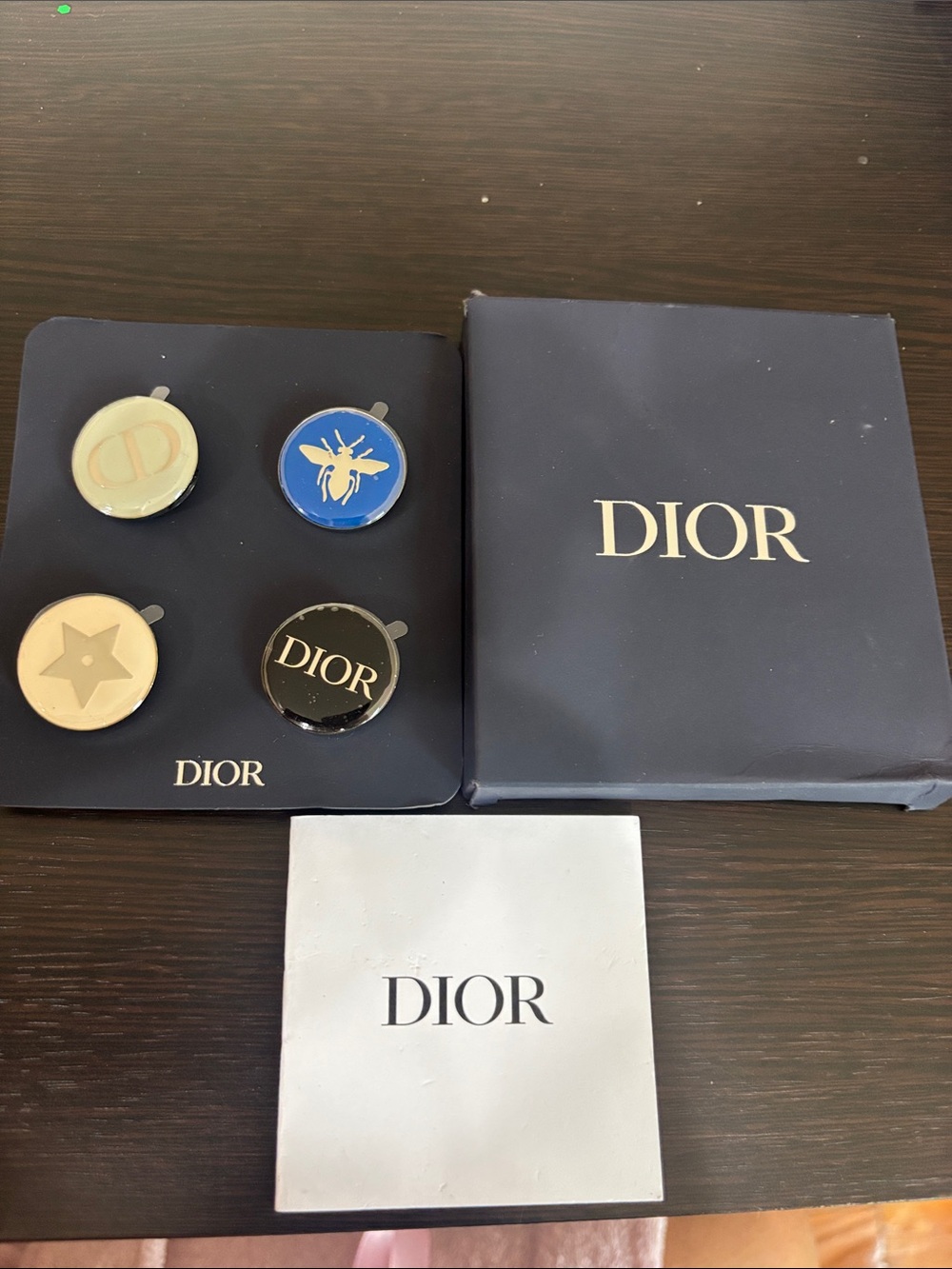 Dior Lapel Pin Set - Blue, Black, Gold, Cream
Button Set with Original Packaging